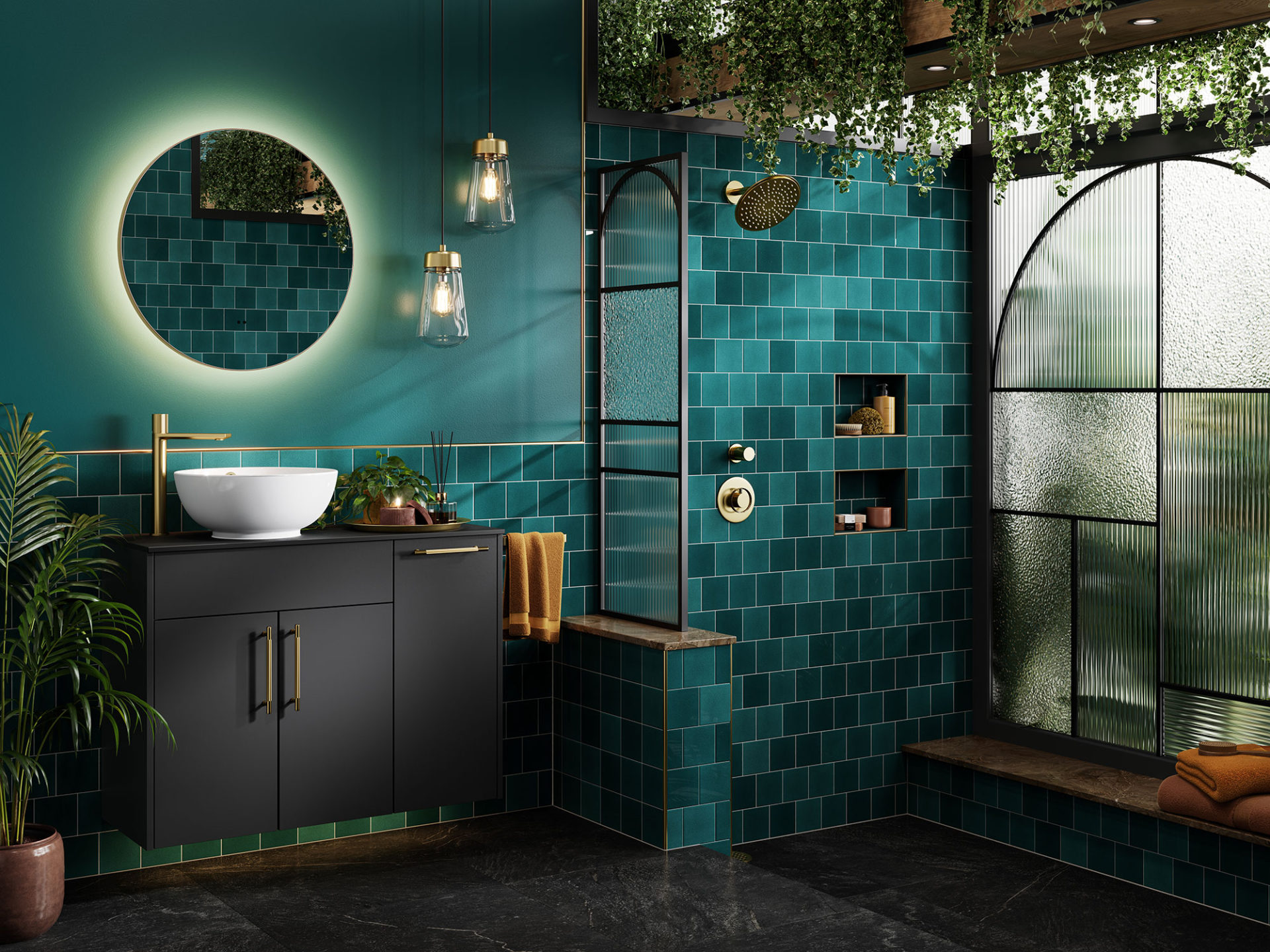 Luxurious bathroom with deep green tiles, a black vanity, gold fixtures, and hanging plants